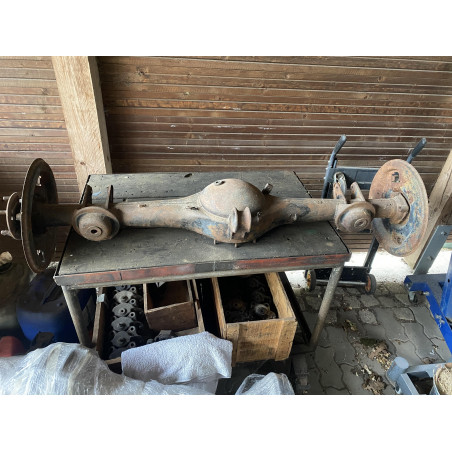Rear axle housing 1900 including half shafts and drum dust plates